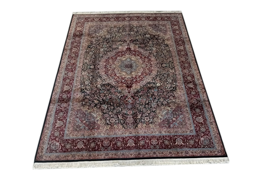 Handcrafted 8x12 Indian Tabriz rug with intricate designs and vibrant colors, showcasing traditional craftsmanship and luxurious texture, perfect for elegant home decor.