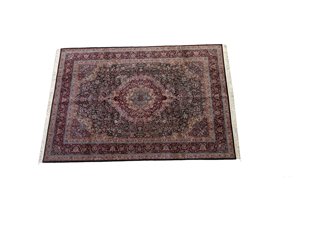 Handcrafted 8x12 Indian Tabriz rug with intricate designs and vibrant colors, showcasing traditional craftsmanship and luxurious texture, perfect for elegant home decor.