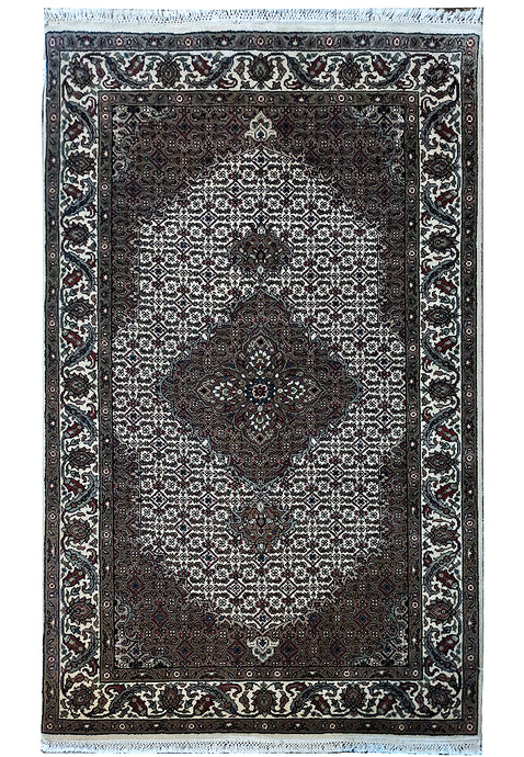 Fine-Quality-Wool-and-Silk-Rug.jpg