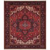 Load image into Gallery viewer, A traditional Persian-style area rug with a complex geometric and floral pattern, featuring a dominant deep red field, a dark navy blue border, and cream accents.