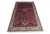 Load image into Gallery viewer, A traditional oriental area rug with a deep red field, intricate floral motifs, and a detailed cream and blue border, shown flat against a white background.