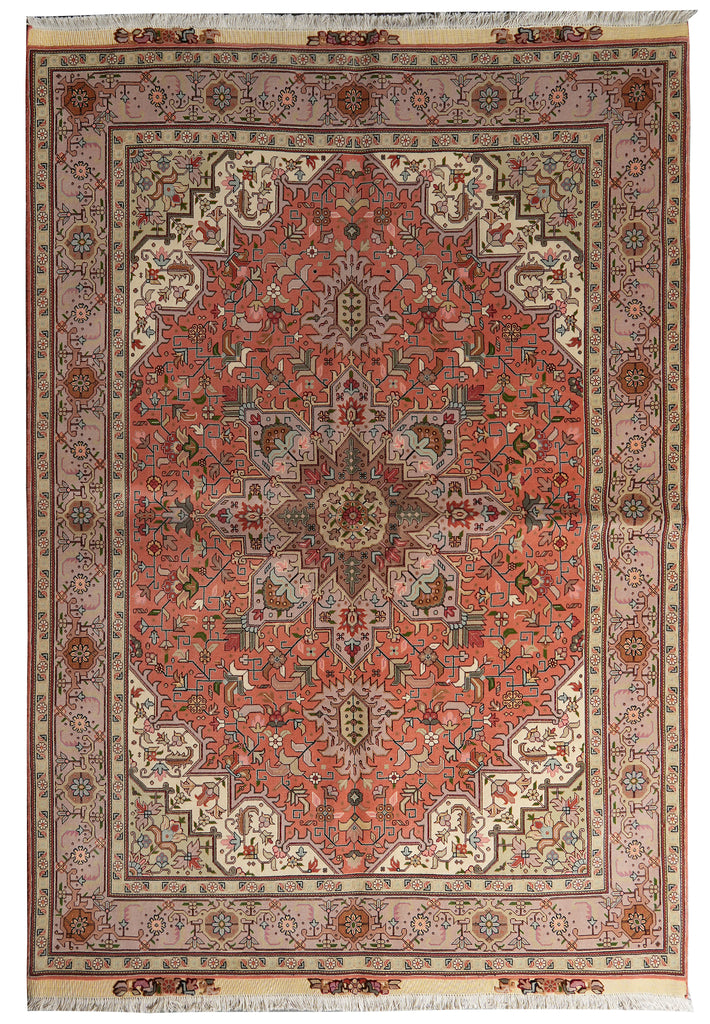 A traditional Persian-style area rug with a complex floral and geometric pattern, featuring a dominant terracotta red center, beige and cream borders, and accents of brown, green, and blue.
