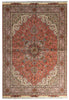 Load image into Gallery viewer, A traditional Persian-style area rug with a complex floral and geometric pattern, featuring a dominant terracotta red center, beige and cream borders, and accents of brown, green, and blue.
