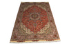 Load image into Gallery viewer, A traditional oriental area rug with a red central medallion, beige and brown borders, and white fringe, shown flat against a white background.