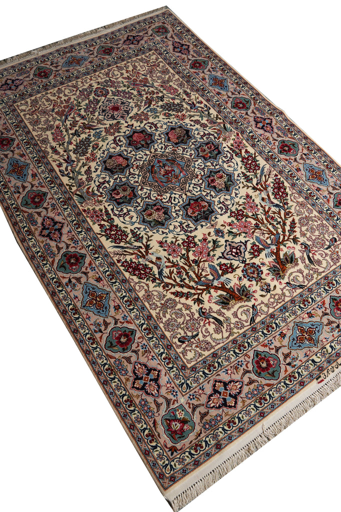 A traditional oriental area rug with an intricate floral and geometric pattern, shown from an angled overhead perspective on a white background.
