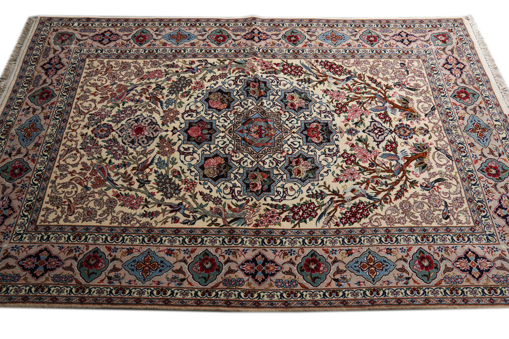 A traditional oriental area rug with an intricate floral and geometric pattern, featuring a central medallion and multiple borders in beige, blue, red, and green tones.