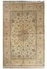 Load image into Gallery viewer, An antique Persian-style area rug with a beige and cream base, decorated with intricate floral motifs in muted blue, brown, and rust red, featuring a central medallion and fringed edges.
