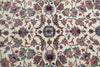 Load image into Gallery viewer, A close-up of an ornate floral patterned rug or textile with a cream background and intricate motifs in blue, pink, red, green, and brown.