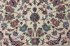 Load image into Gallery viewer, A close-up of an ornate floral patterned rug or textile on a cream background, featuring blue, red, green, and brown botanical motifs.