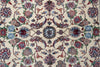 Load image into Gallery viewer, A close-up of an ornate floral patterned rug with a cream background and intricate motifs in blue, red, green, and brown.