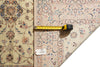 Load image into Gallery viewer, A close-up of a patterned area rug with a tape measure laid across it and a small product tag reading PIX 23965. The rug has an ornate floral and scroll design in beige, blush pink, cream, and muted blue tones.