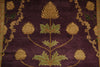 Load image into Gallery viewer, Close-up of a woven textile or rug featuring a botanical pattern with tan thistle-like flowers, green leaves, and ornate gold vine motifs on a deep purple background.