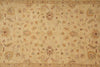 Load image into Gallery viewer, A square area rug with an intricate traditional floral pattern in beige, tan, brown, and muted green tones.
