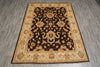 Load image into Gallery viewer, A rectangular area rug with an ornate floral and medallion pattern, featuring a dark brown center and a beige border, laid out on a gray wood-look floor.