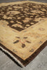Load image into Gallery viewer, A traditional oriental-style area rug with a dark brown floral field and a beige border, shown laid out on a gray tiled floor.