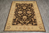 Load image into Gallery viewer, A rectangular area rug with a traditional floral pattern, featuring a dark brown center field and a warm beige border, laid out on a gray wood-look floor.