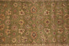 Load image into Gallery viewer, An antique-style area rug with an olive green field, featuring a repeating pattern of floral medallions in beige, rust red, and brown, finished with a detailed border.