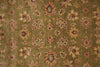 Load image into Gallery viewer, A close-up of an ornate floral patterned rug or textile in muted olive green, tan, beige, and burgundy tones, filling the entire frame.