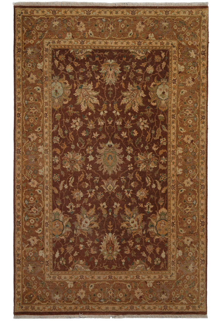 A traditional oriental area rug with an intricate floral pattern, featuring a dark brown center field, a golden-brown border, and muted accents of beige, green, and blue.