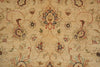 Load image into Gallery viewer, A close-up of a traditional patterned rug with a beige background and intricate floral motifs in muted red, green, and brown.