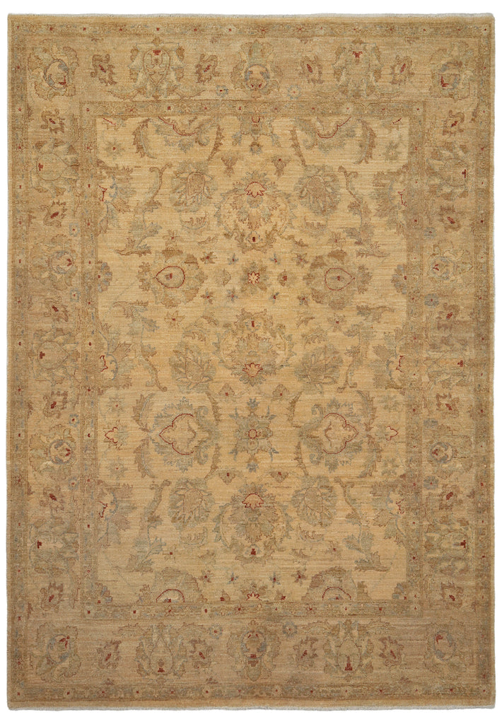 A traditional oriental-style area rug with an intricate floral and medallion pattern in beige, tan, muted blue, and soft red tones, shown flat against a white background.