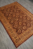 Load image into Gallery viewer, An oriental-style area rug with an intricate floral and geometric pattern, shown laid out on a gray wood-look floor.