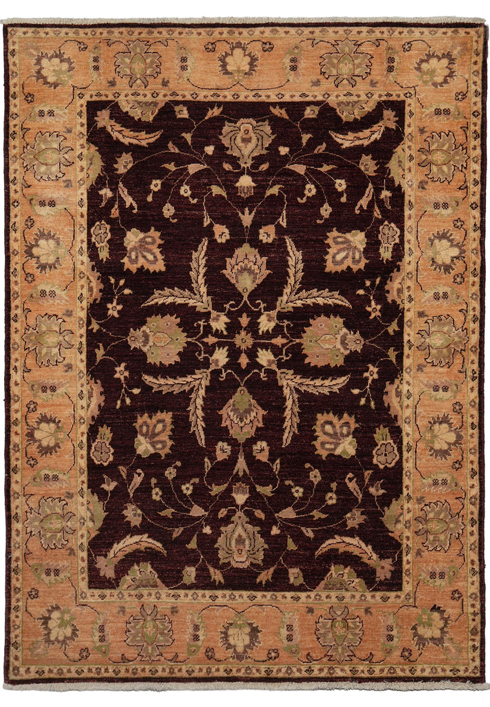 A traditional oriental-style area rug with a dark brown central field, surrounded by a warm peach-beige border with floral motifs and a thin dark edge.