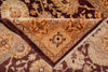 Load image into Gallery viewer, A close-up of a traditional oriental rug showing its detailed floral pattern and corner design in warm tones of beige, brown, and deep burgundy.