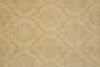 Load image into Gallery viewer, Beige textured fabric with a subtle distressed geometric lattice pattern in muted gray-green tones.