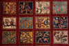 Load image into Gallery viewer, A close-up of a woven rug or textile featuring a grid of 12 square panels with abstract floral and geometric motifs in navy, mustard, beige, and green, set against a deep red field.