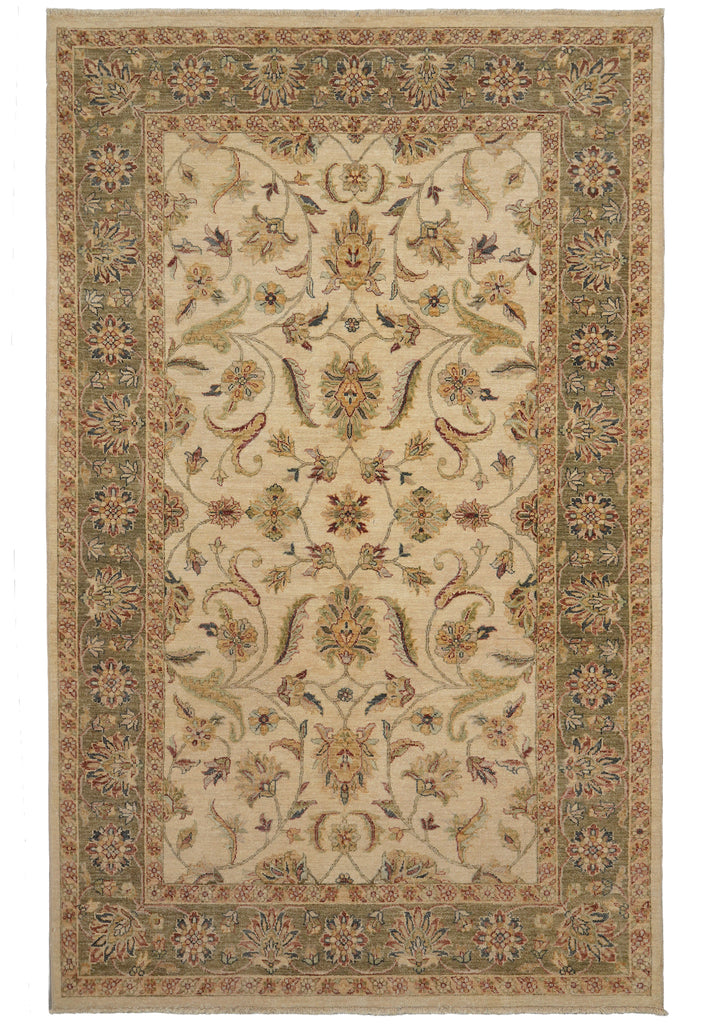 A traditional oriental-style area rug with an intricate floral and scroll pattern, featuring a beige center field, olive green borders, and accents of rust, blue, and brown.