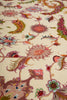 Load image into Gallery viewer, Close-up of the Persian Tabriz rug field pattern with hand-knotted floral blossoms in pink, coral, and green on an ivory background