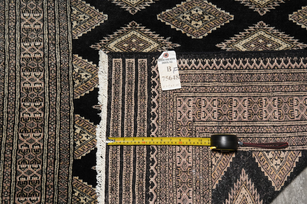 Patterned rug with a size tag.