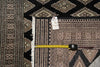 Load image into Gallery viewer, Patterned rug with a size tag.