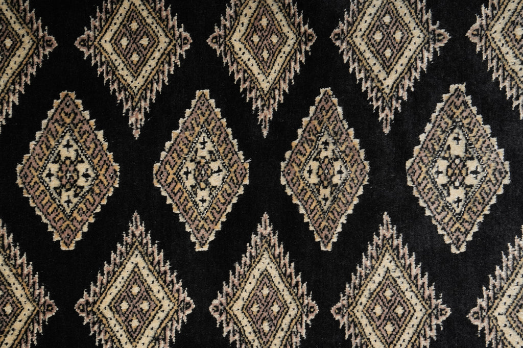 Patterned fabric with geometric design on a black background