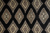 Load image into Gallery viewer, Patterned fabric with geometric design on a black background
