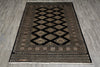 Load image into Gallery viewer, Decorative rug with geometric pattern on a wooden floor