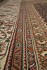 Load image into Gallery viewer, Close-up of a patterned rug with intricate designs.