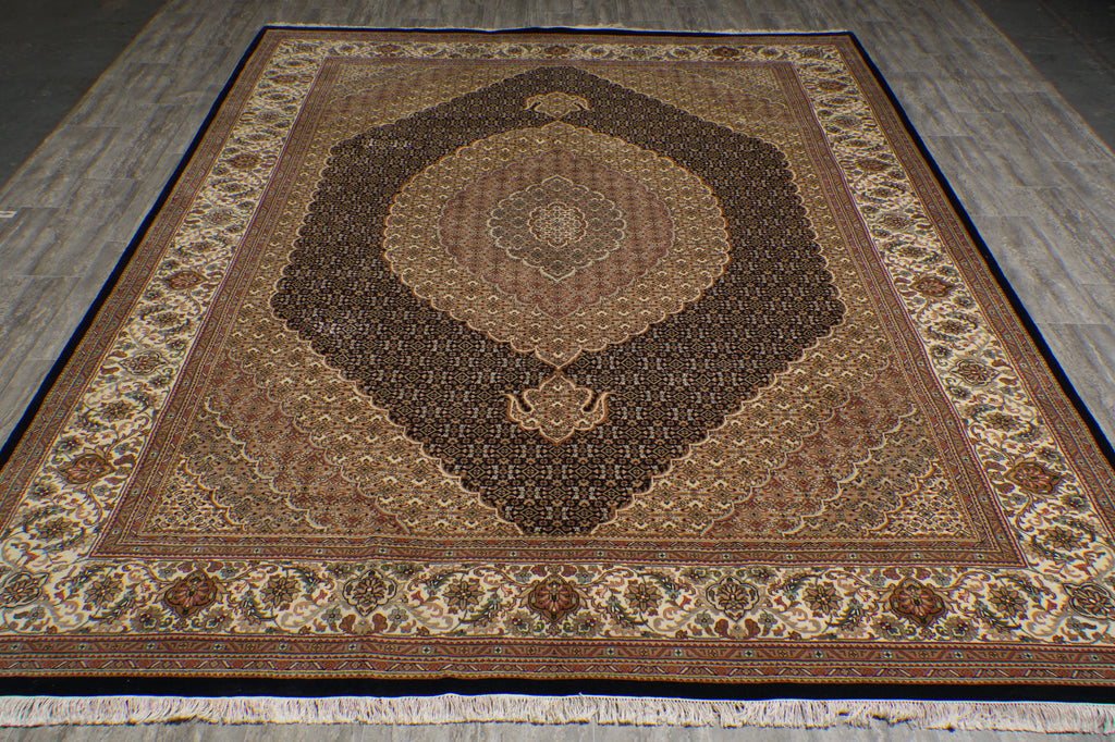 Decorative rug with intricate patterns on a wooden floor