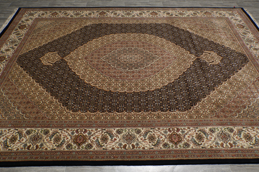 Decorative rug with intricate patterns on a wooden floor