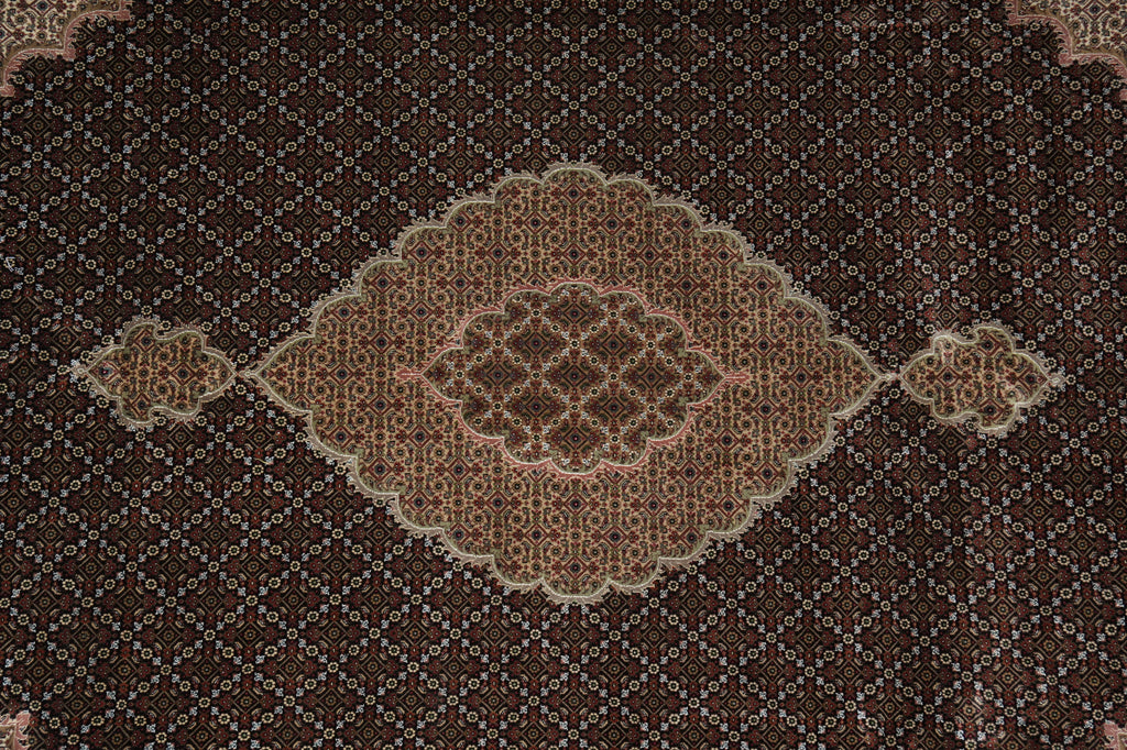 Brown patterned rug with intricate design