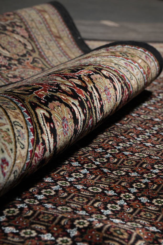 Close-up of patterned fabric with intricate designs