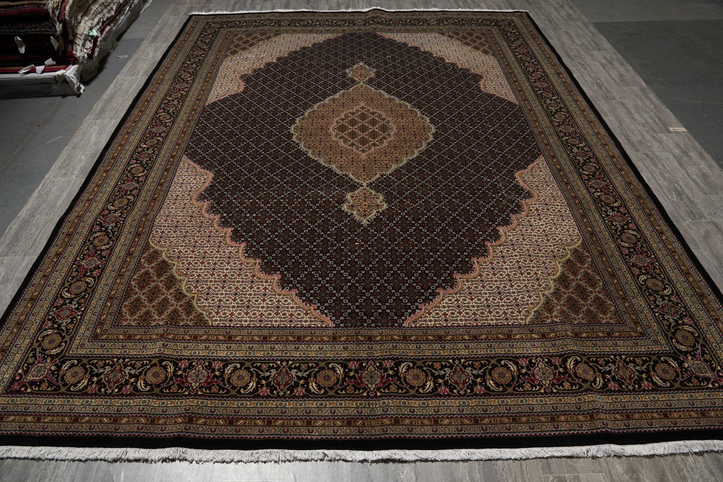 Decorative rug with intricate patterns on a wooden floor