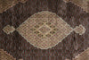 Load image into Gallery viewer, Close-up of a patterned rug with a central diamond design