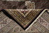 Load image into Gallery viewer, Close-up of intricately patterned rugs with a focus on texture and design.
