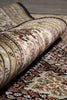 Load image into Gallery viewer, Close-up of a patterned rug with intricate designs.