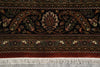 Load image into Gallery viewer, Close-up of a patterned rug with intricate designs and fringes.