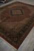 Load image into Gallery viewer, Decorative rug with intricate patterns on a gray floor