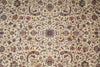Load image into Gallery viewer, Close-up of a patterned rug with intricate designs on a beige background