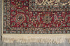 Load image into Gallery viewer, Close-up of a patterned rug with intricate designs and fringes.